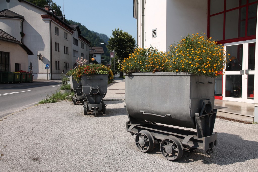 Mine carts, used as flower pots, in front of the fire station.