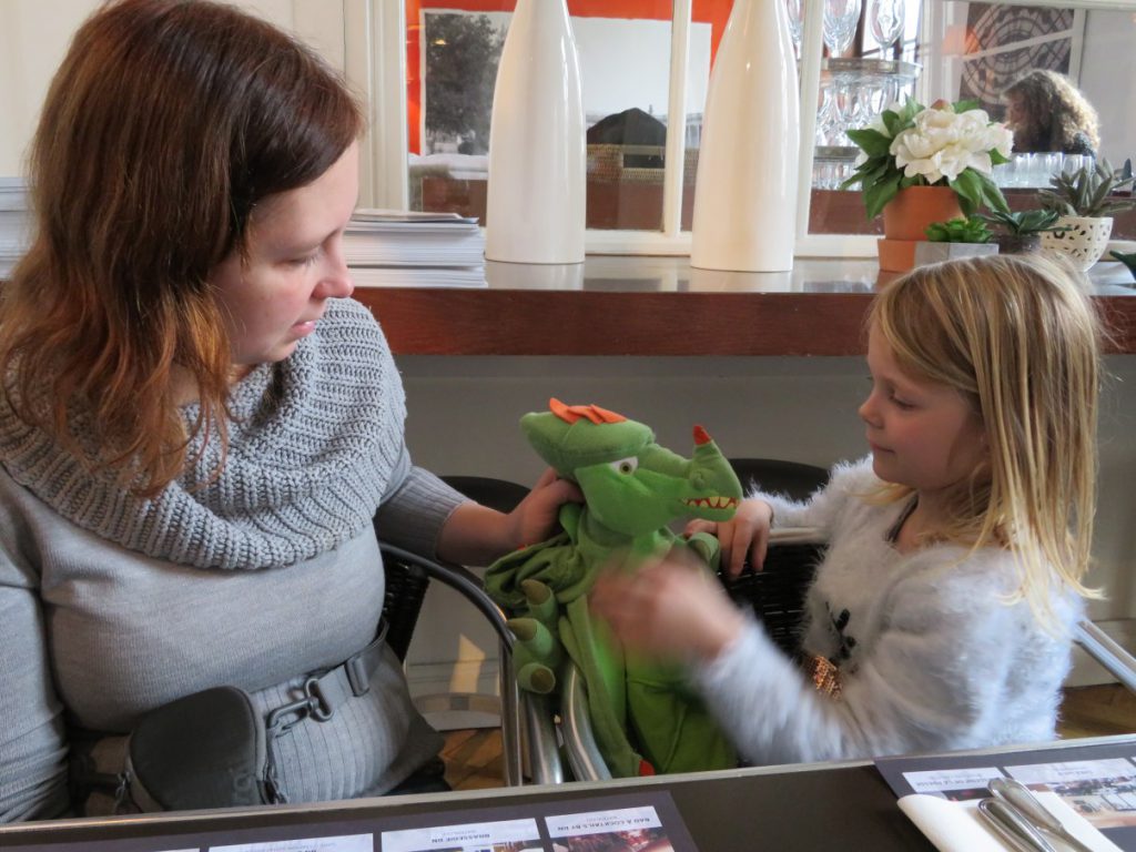 Having a conversation with Vurie in the restaurant.