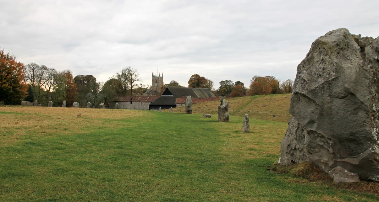 Part of an inner stone circle. In the background you can see St James church of Avebury.